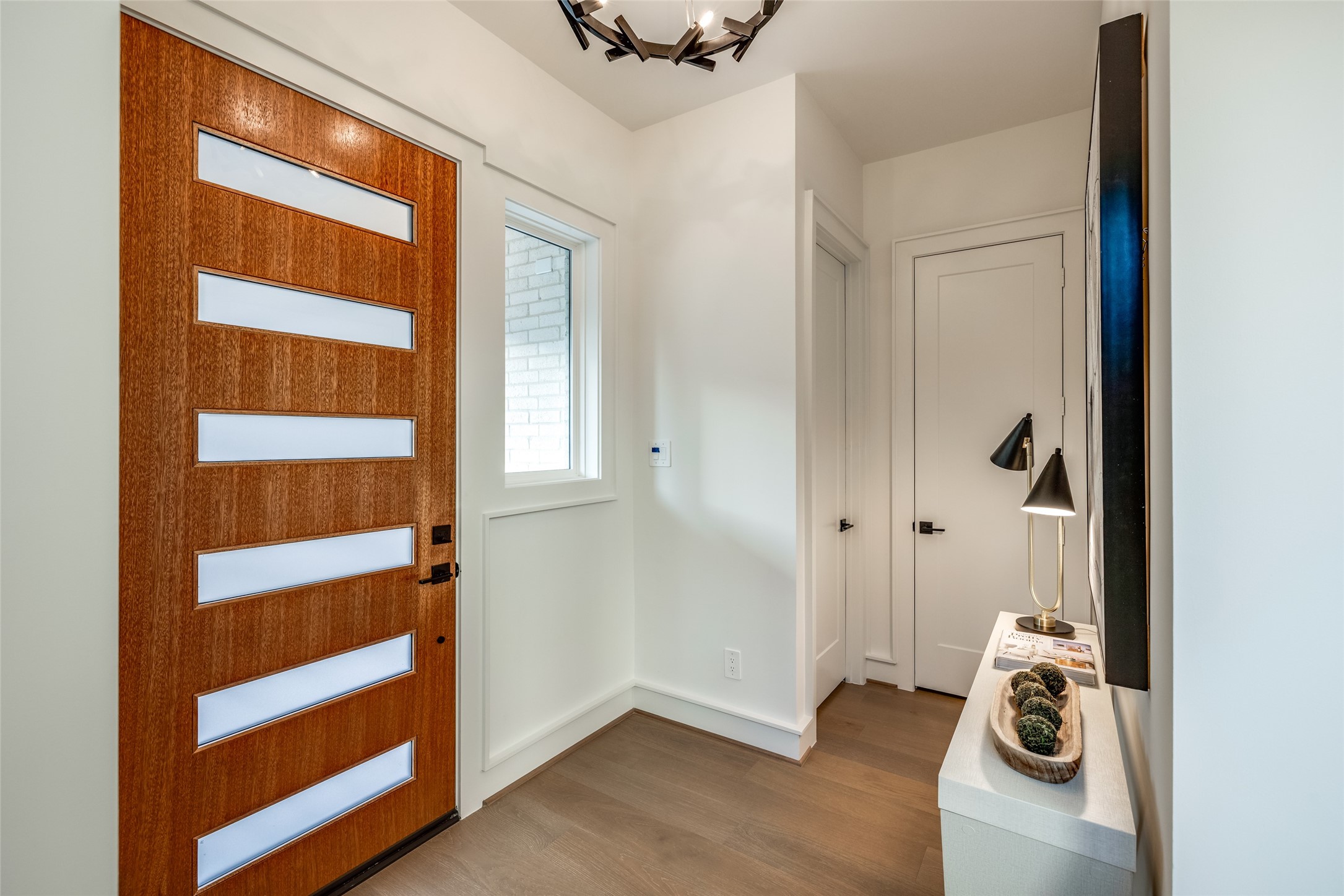 2213 Whitney Street Houston, TX 77006 - Photo 3 of 46 a view of an entryway with wooden floor