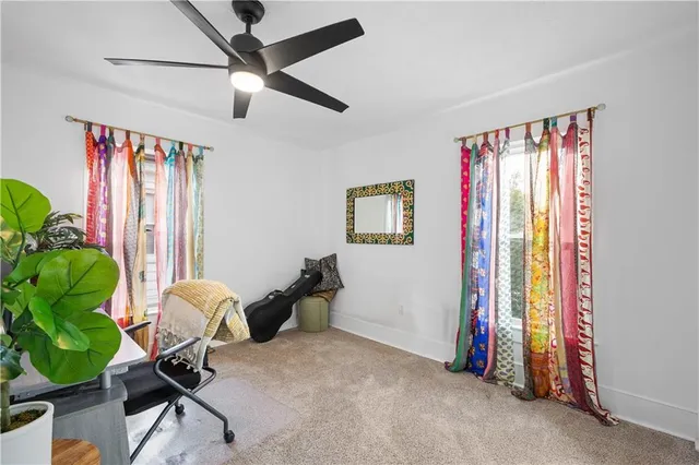 a workspace with furniture and a window