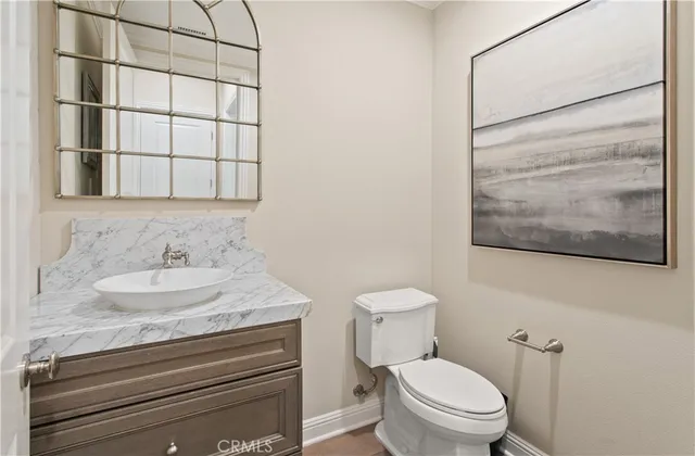 a bathroom with a sink and a toilet