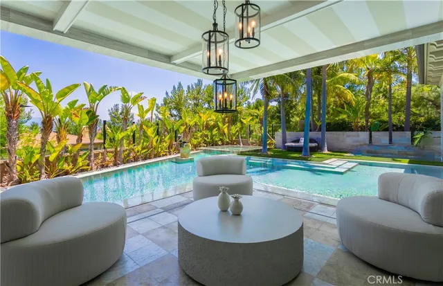 a living room with couches and a table