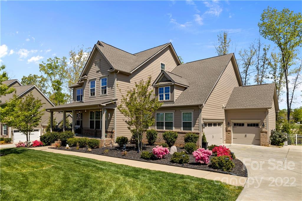 1908 Chatooka Lane Waxhaw, NC 28173 - Photo 2 of 47 a front view of a house with a yard