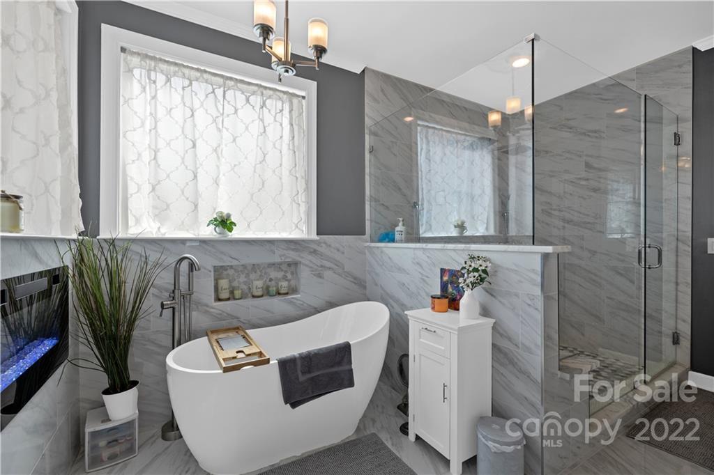 1908 Chatooka Lane Waxhaw, NC 28173 - Photo 28 of 47 a bathroom with a sink toilet and shower
