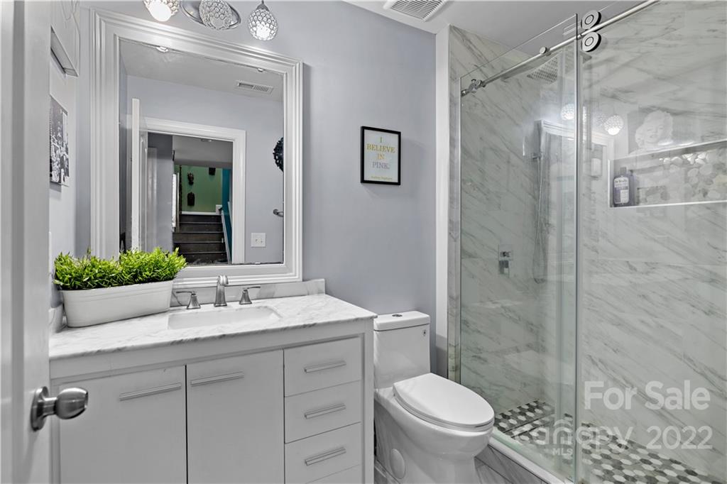 1908 Chatooka Lane Waxhaw, NC 28173 - Photo 37 of 47 a bathroom with a sink toilet and shower