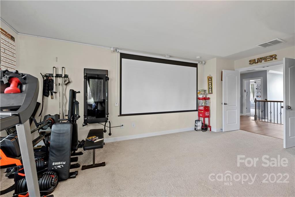 1908 Chatooka Lane Waxhaw, NC 28173 - Photo 41 of 47 a view of a room with gym equipment