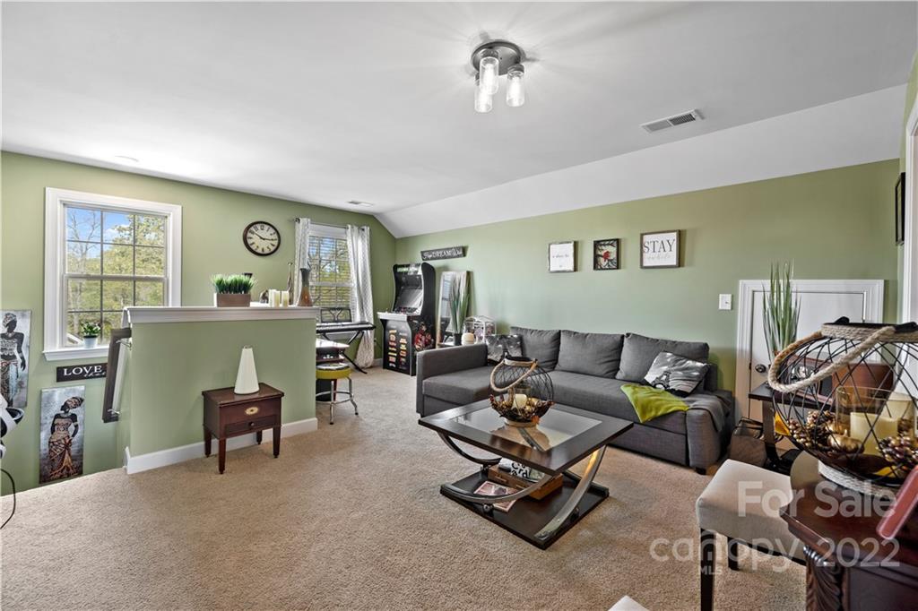 1908 Chatooka Lane Waxhaw, NC 28173 - Photo 42 of 47 a living room with furniture and wooden floor
