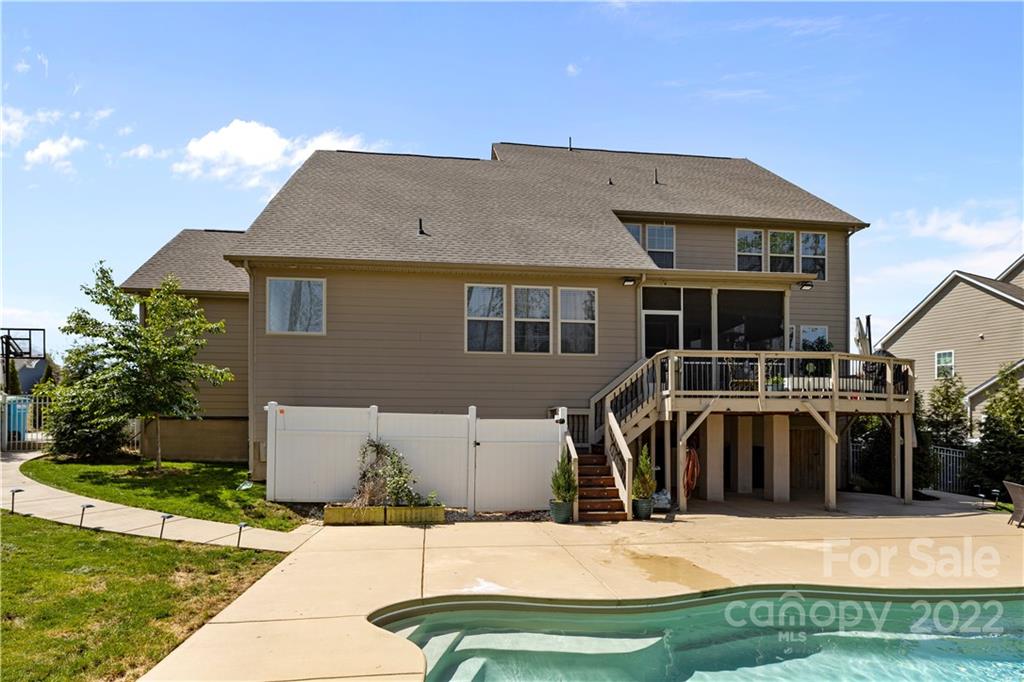 1908 Chatooka Lane Waxhaw, NC 28173 - Photo 7 of 47 a view of swimming pool with a yard