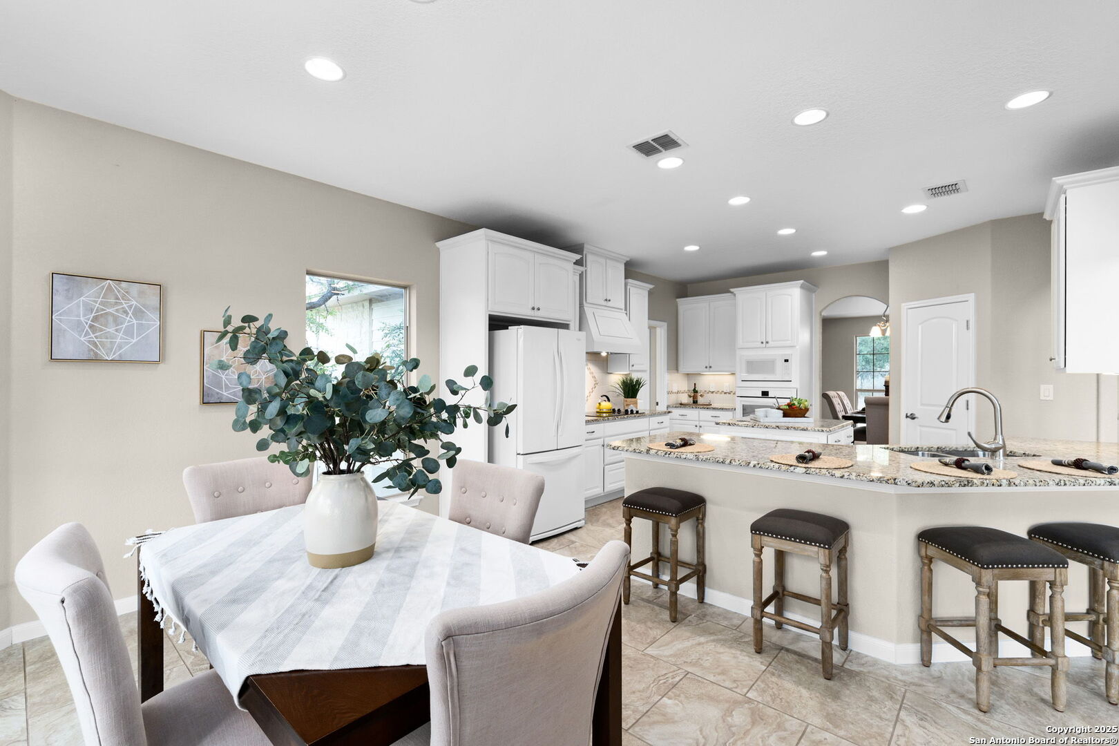 171 Clear Ridge New Braunfels, TX 78132 - Photo 15 of 41 a kitchen with a table and chairs