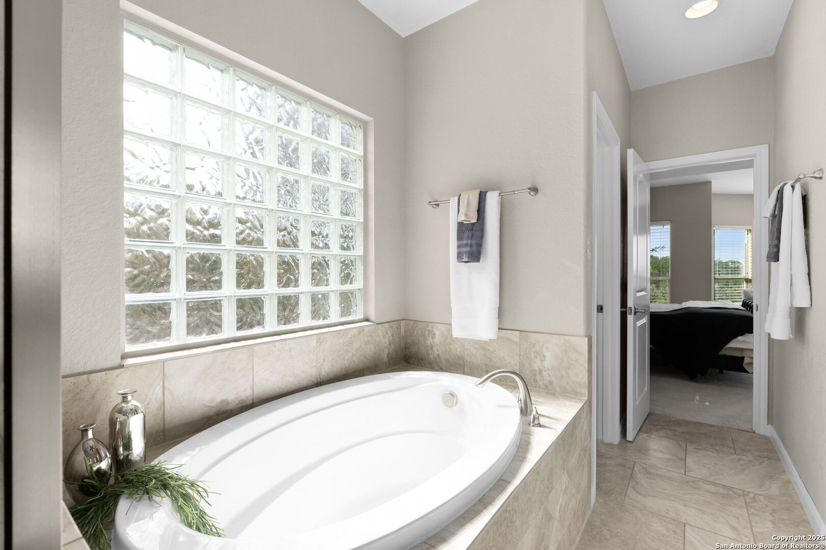 171 Clear Ridge New Braunfels, TX 78132 - Photo 24 of 41 a bath tub sitting in a bathroom next to a window