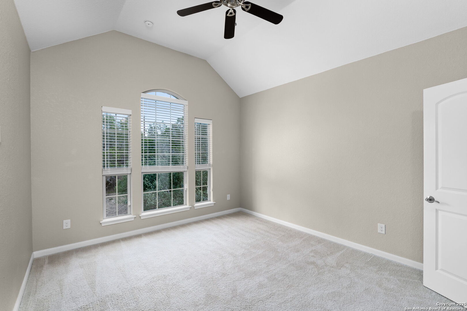171 Clear Ridge New Braunfels, TX 78132 - Photo 28 of 41 an empty room with windows and ceiling fan