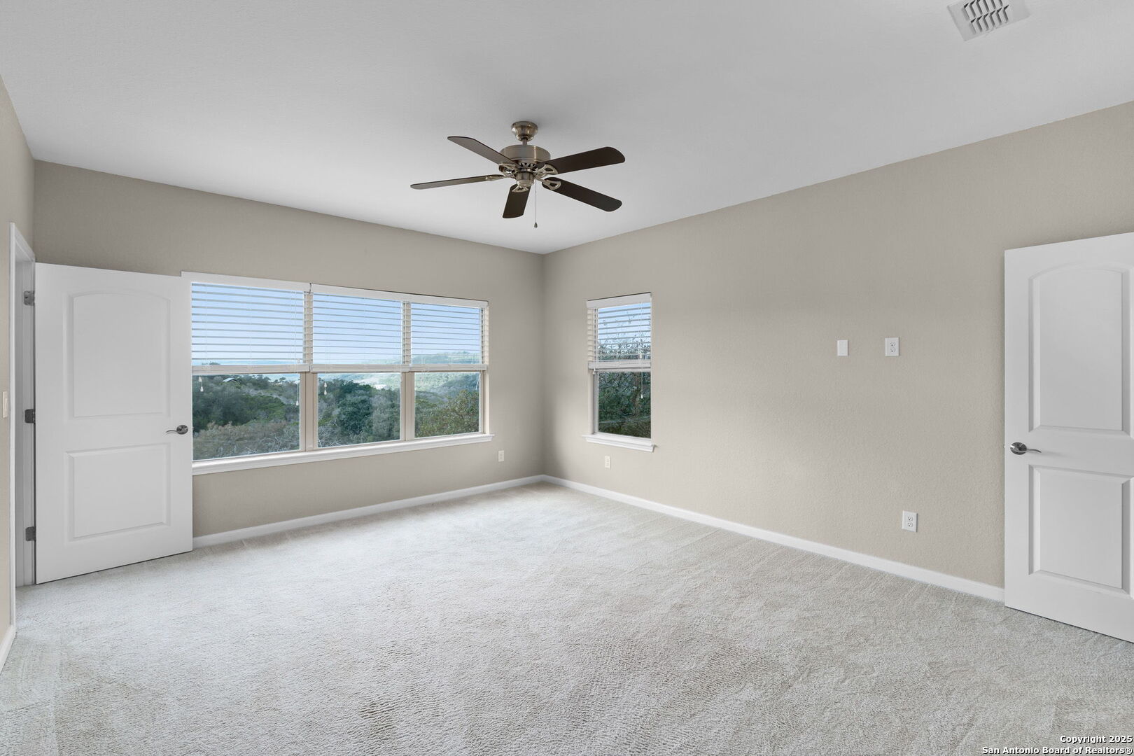 171 Clear Ridge New Braunfels, TX 78132 - Photo 33 of 41 a view of empty room with window and ceiling fan