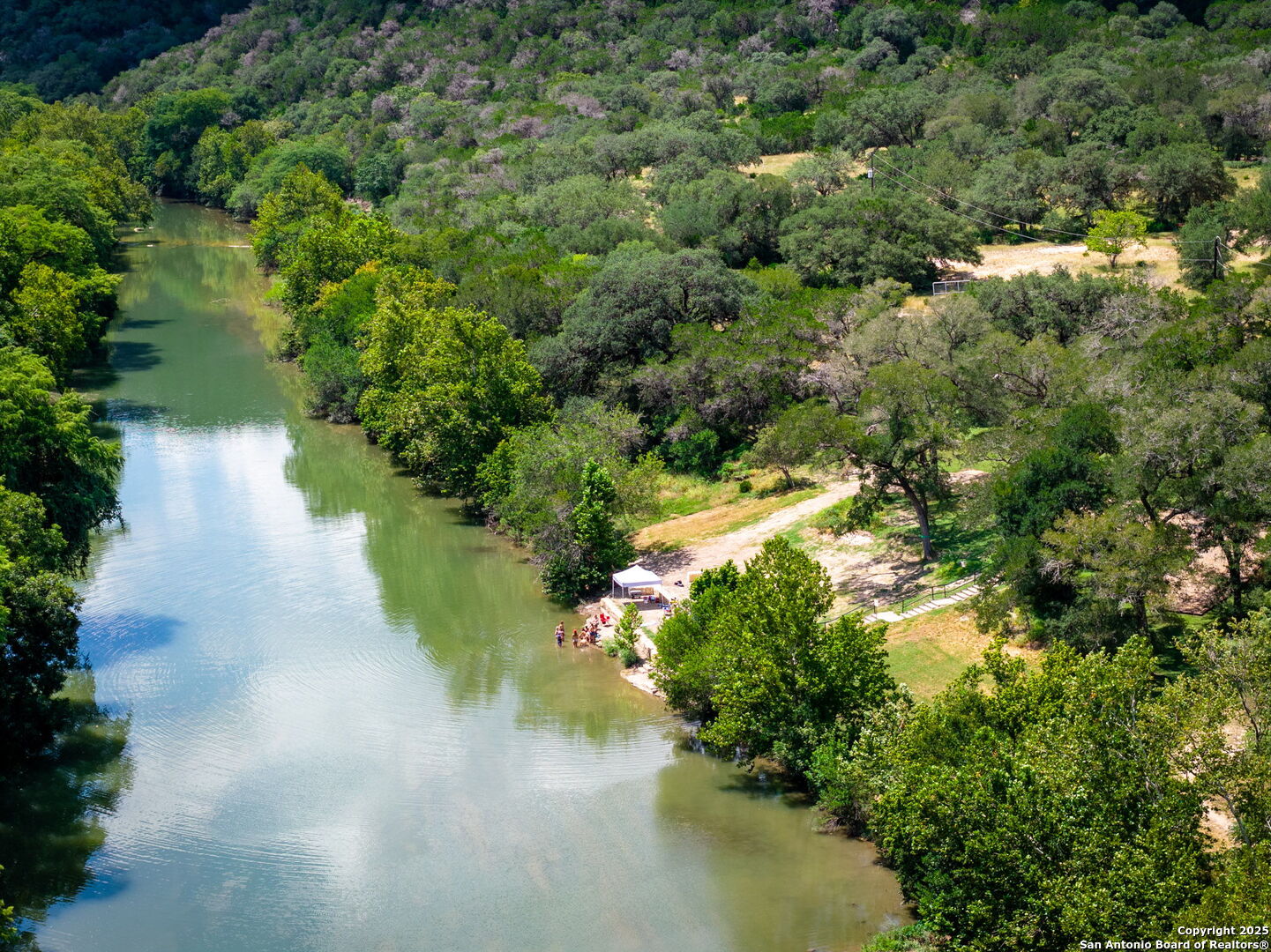 171 Clear Ridge New Braunfels, TX 78132 - Photo 39 of 41 a view of a yard with a tree