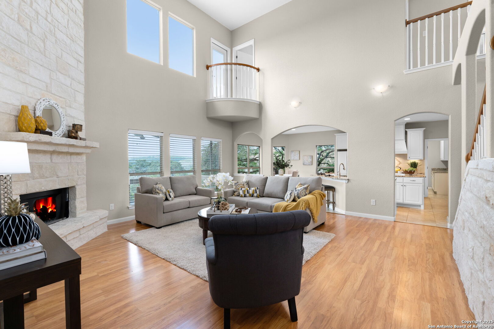 171 Clear Ridge New Braunfels, TX 78132 - Photo 7 of 41 a living room with fireplace furniture and a wooden floor