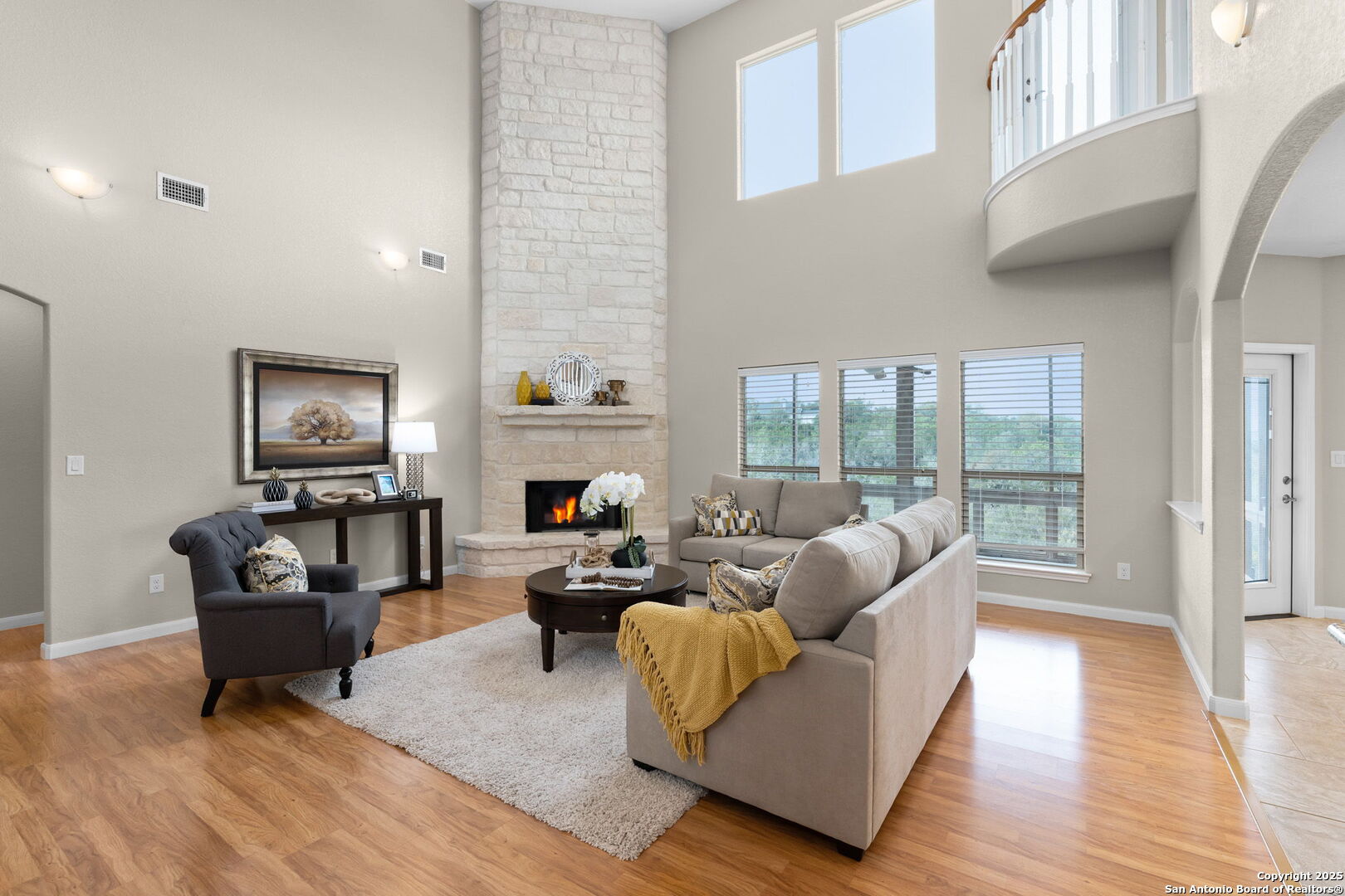 171 Clear Ridge New Braunfels, TX 78132 - Photo 8 of 41 a living room with fireplace furniture and a wooden floor