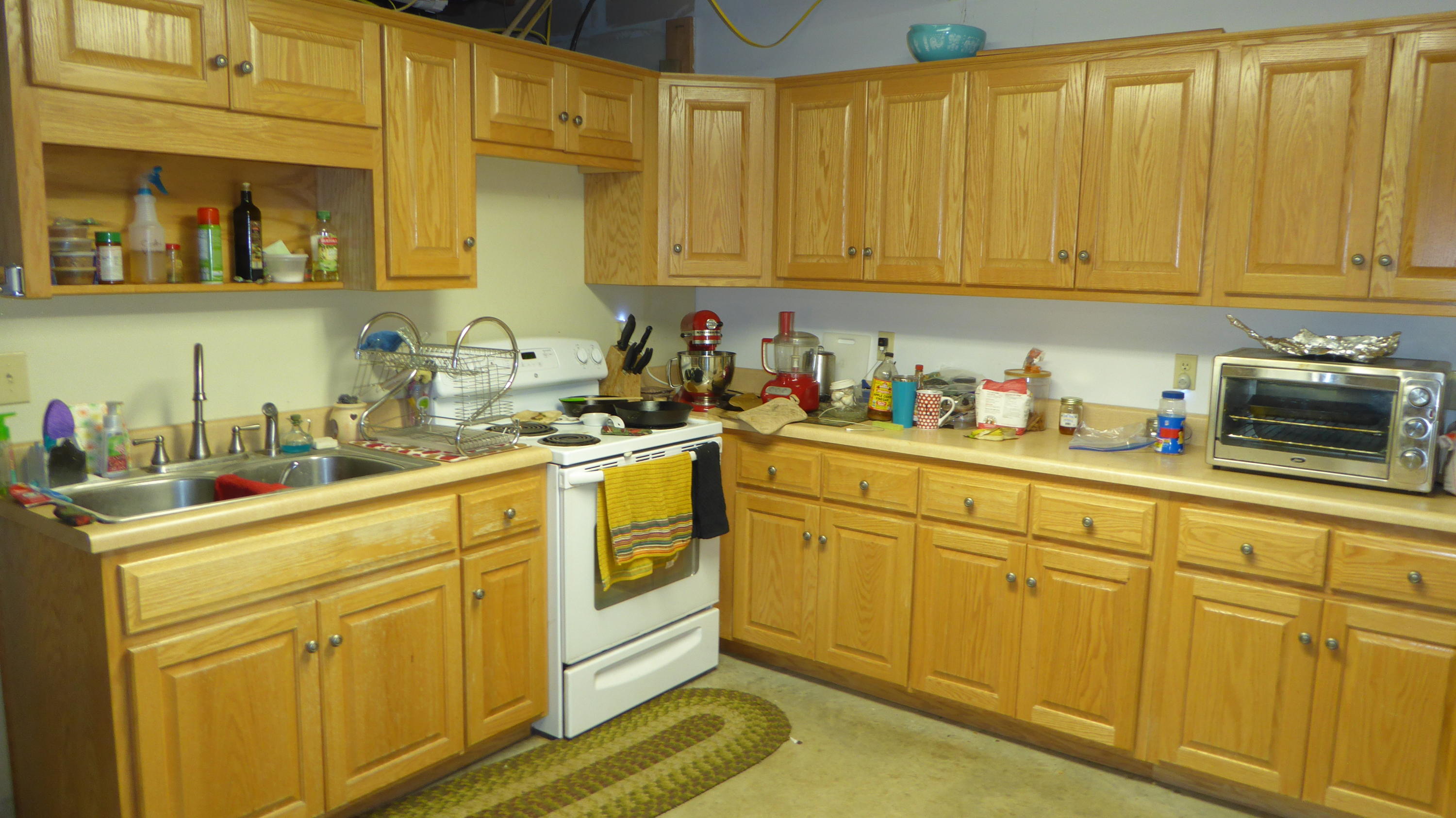 952 Rock Ridge Road Callaway, VA 24067 - Photo 17 of 46 a kitchen with white cabinets and white appliances