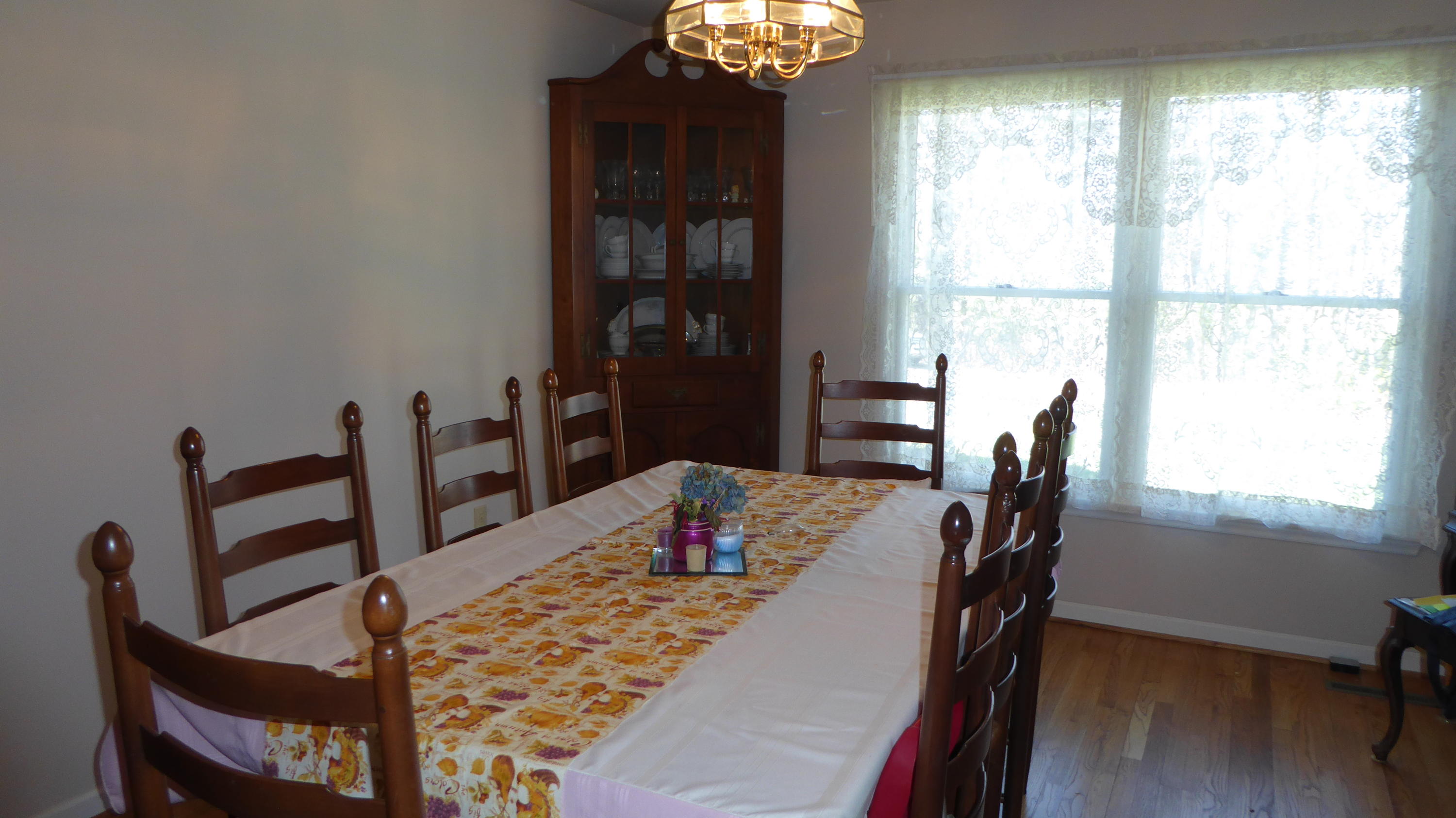 952 Rock Ridge Road Callaway, VA 24067 - Photo 30 of 46 a view of a dining room with furniture and a window