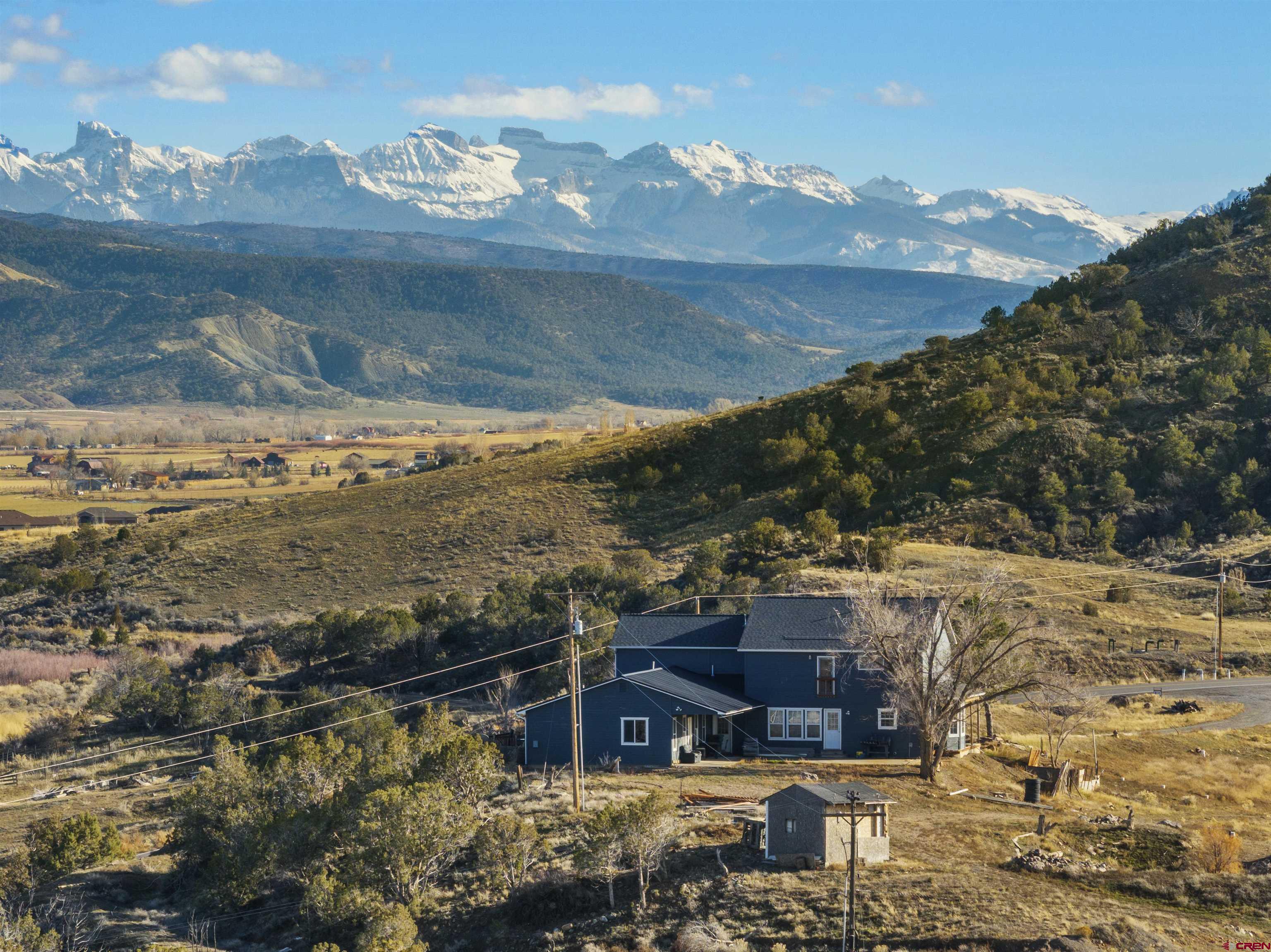 21835 Government Springs Road Montrose, CO 81403 - Photo 3 of 7 a view of houses with outdoor space