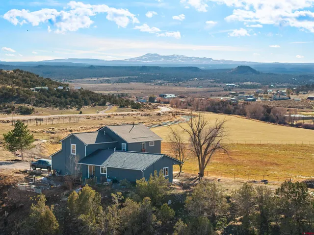 a view of a city with an ocean