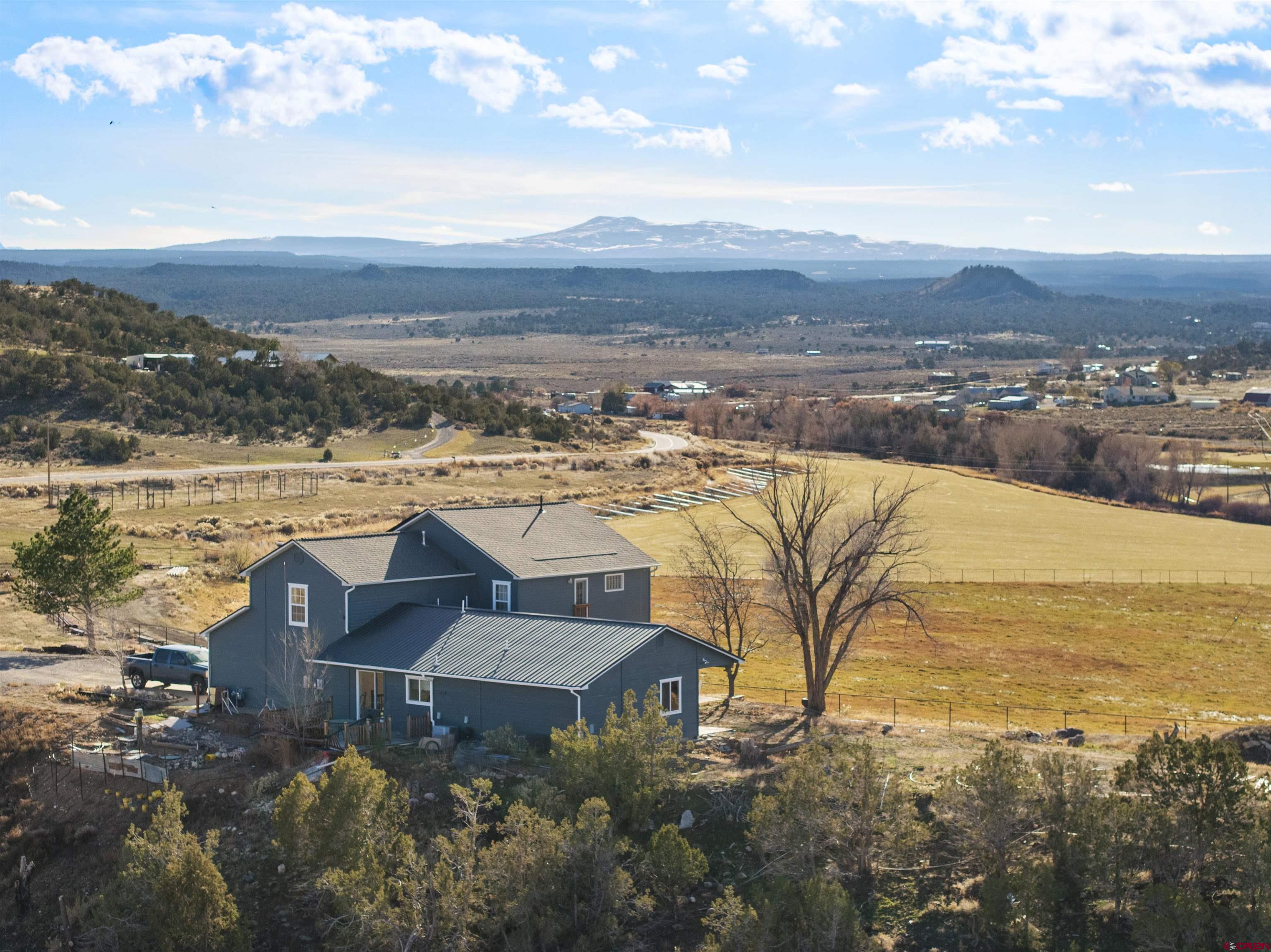 21835 Government Springs Road Montrose, CO 81403 - Photo 4 of 7 a view of a city with an ocean