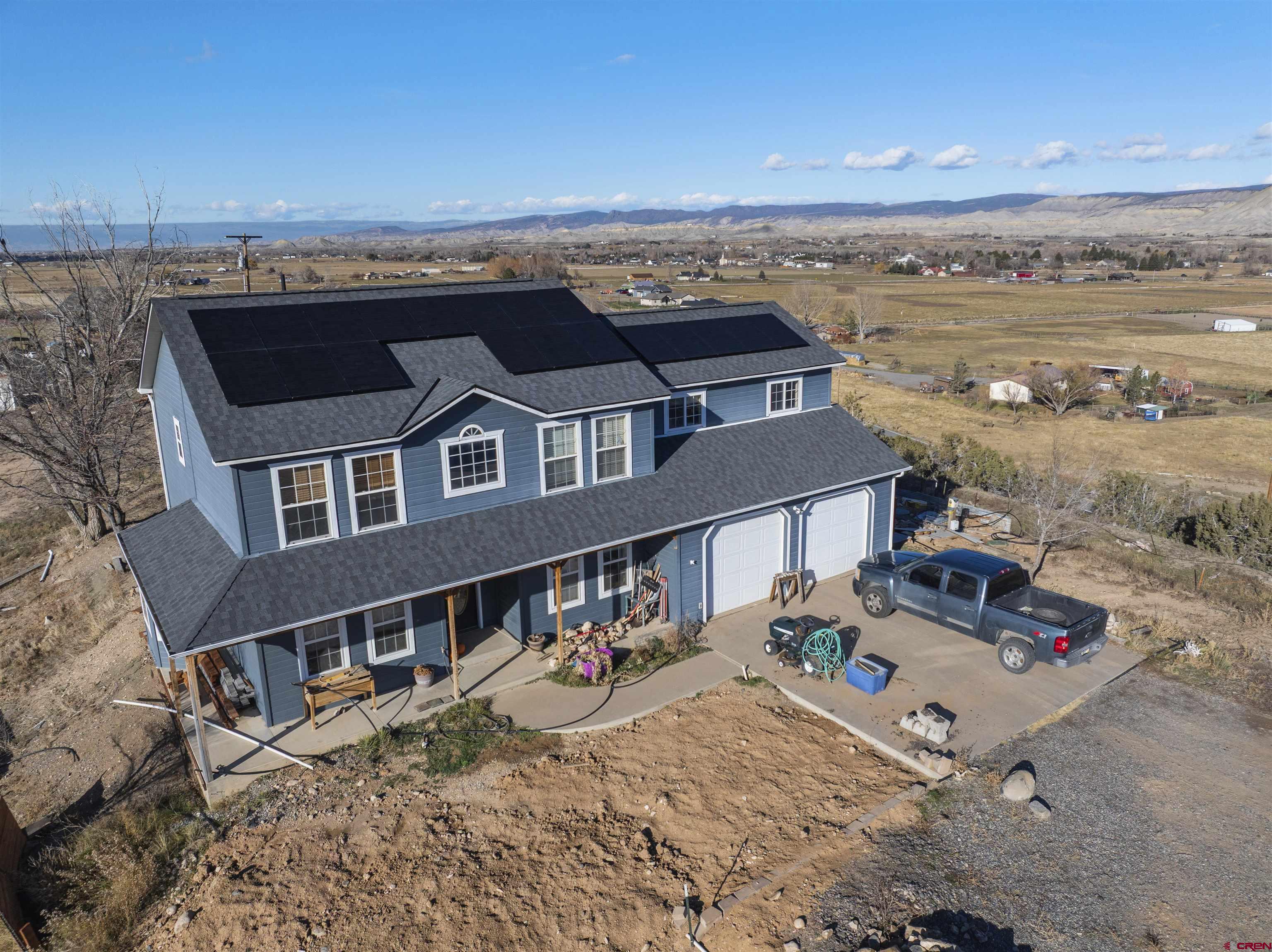 21835 Government Springs Road Montrose, CO 81403 - Photo 6 of 7 an aerial view of a house with a ocean view