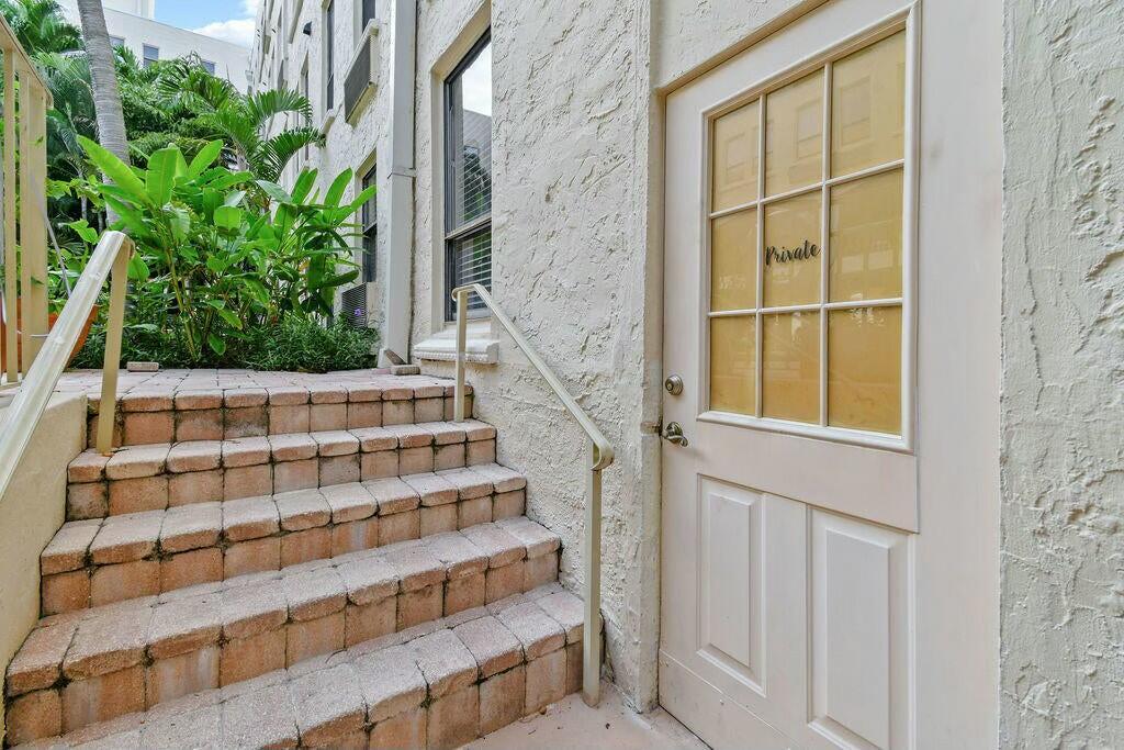 235 Sunrise Avenue, Unit 1050 Palm Beach, FL 33480 - Photo 1 of 29 a view of wooden door with a window