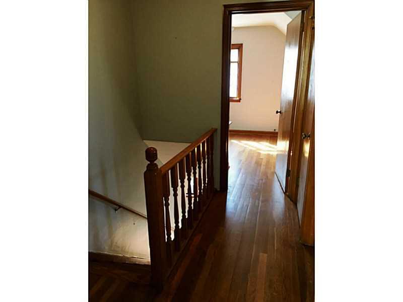 1136 9th Street McKees Rocks, PA 15136 - Photo 14 of 17 Hallway,stairs and bedroom with gleaming hardwood floors!!