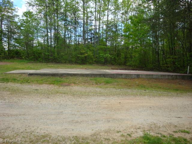 465 Stanley Road Stokesdale, NC 27357 - Photo 9 of 13 Concrete pad for shop or garage