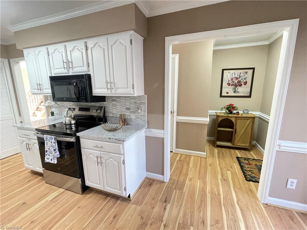 4536 Hamptonshire Drive Raleigh, NC 27613 - Photo 4 of 19 Spacious Gourmet Kitchen with break area