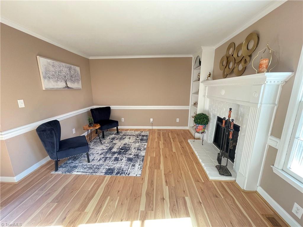 4536 Hamptonshire Drive Raleigh, NC 27613 - Photo 7 of 19 Family Room w/Wood Burning Fireplace