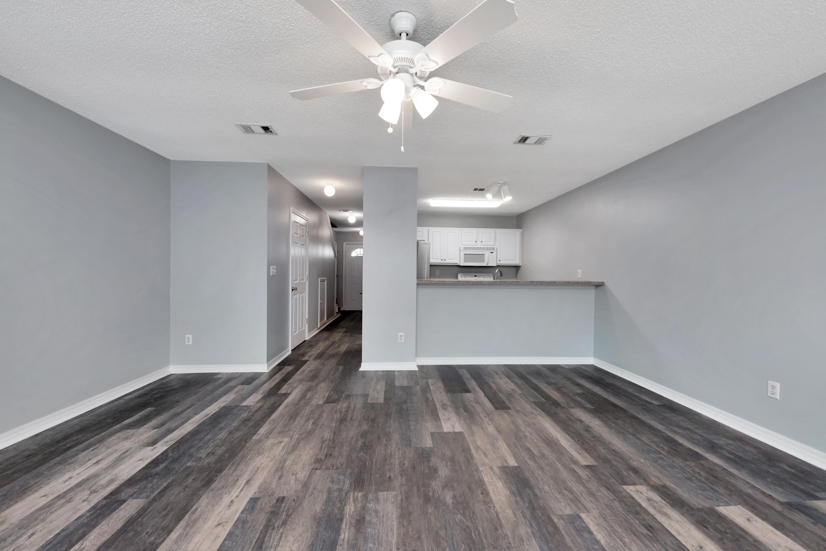 502 Keystone Road Mary Esther, FL 32569 - Photo 9 of 16 a view of a kitchen with a microwave and a stove