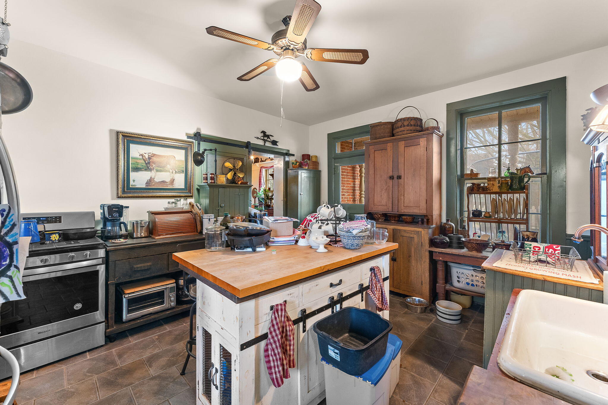 513 3rd Street La Porte, IN 46350 - Photo 12 of 27 a view of a kitchen area with furniture and stove