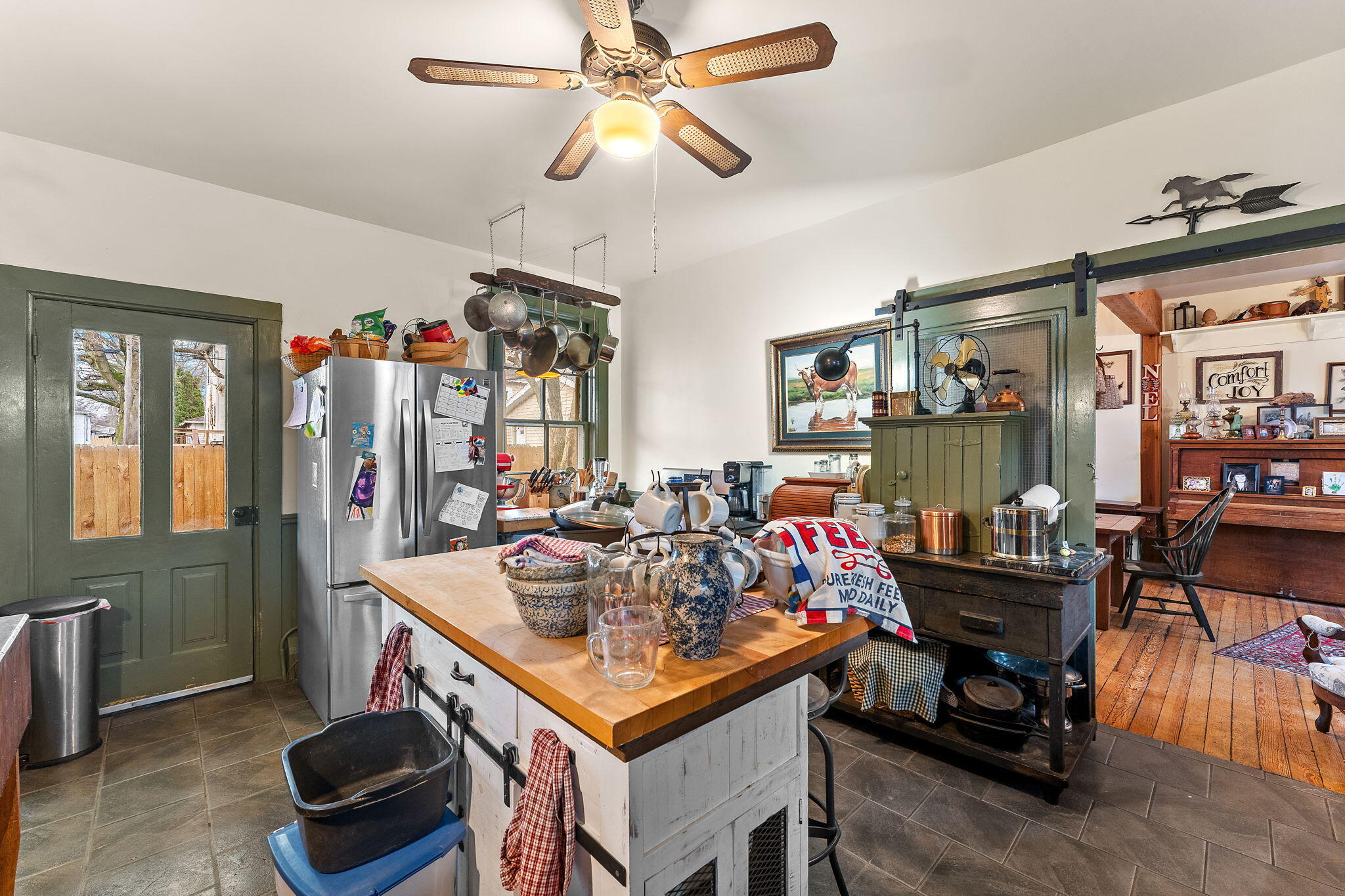 513 3rd Street La Porte, IN 46350 - Photo 13 of 27 a view of a dining room with furniture and chandelier
