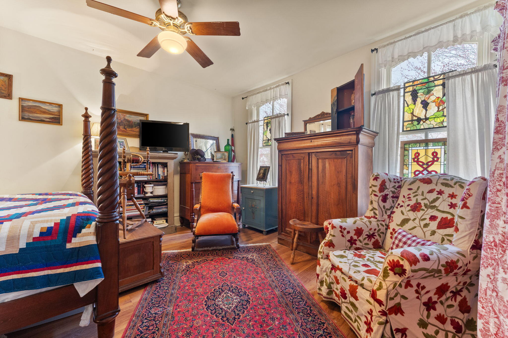 513 3rd Street La Porte, IN 46350 - Photo 23 of 27 a bedroom with a bed and wooden floor