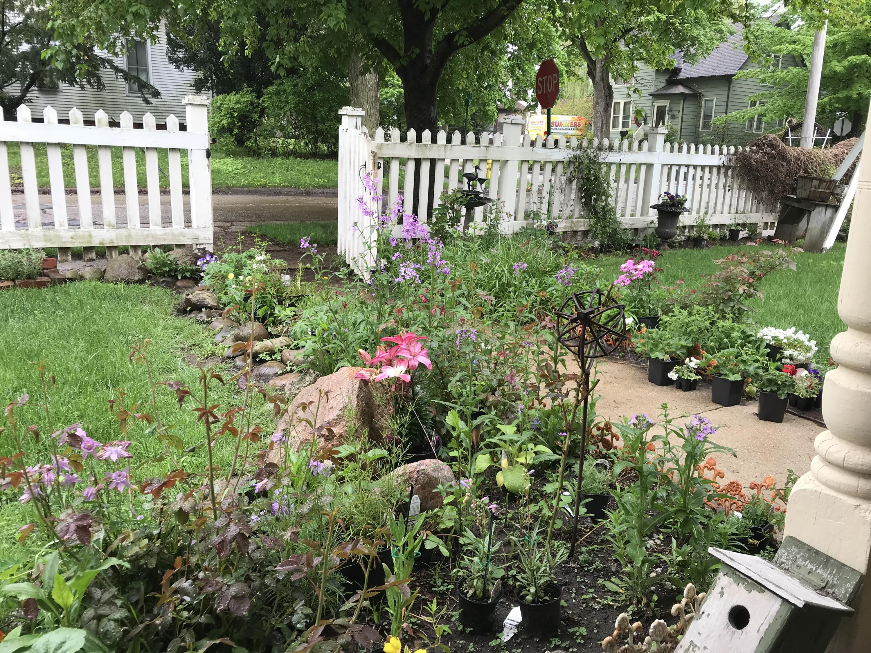 513 3rd Street La Porte, IN 46350 - Photo 4 of 27 a view of a house with a flower garden
