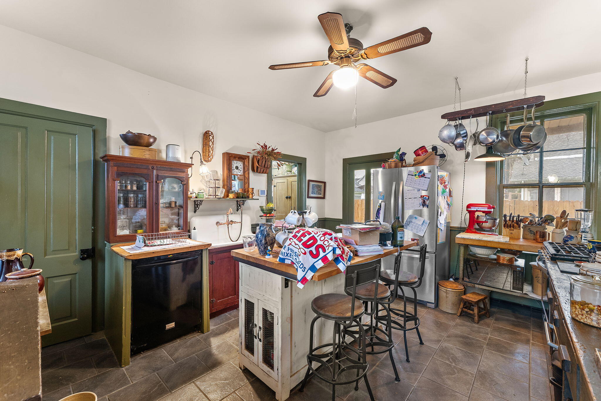513 3rd Street La Porte, IN 46350 - Photo 10 of 27 a view of a dining room with furniture fan and window