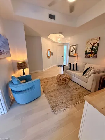 a bedroom with furniture and window