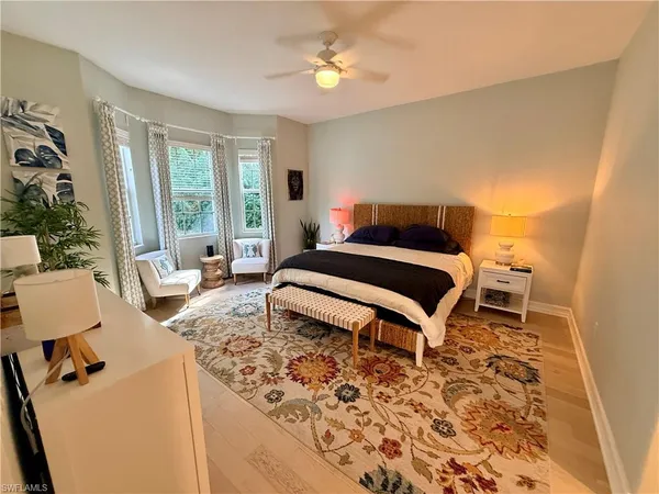 a bathroom with a double vanity sink mirror and toilet