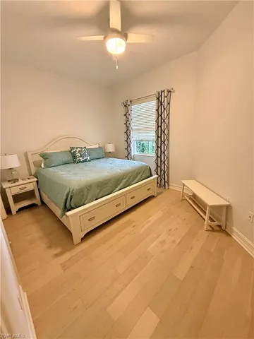 a bathroom with a double vanity sink mirror and toilet