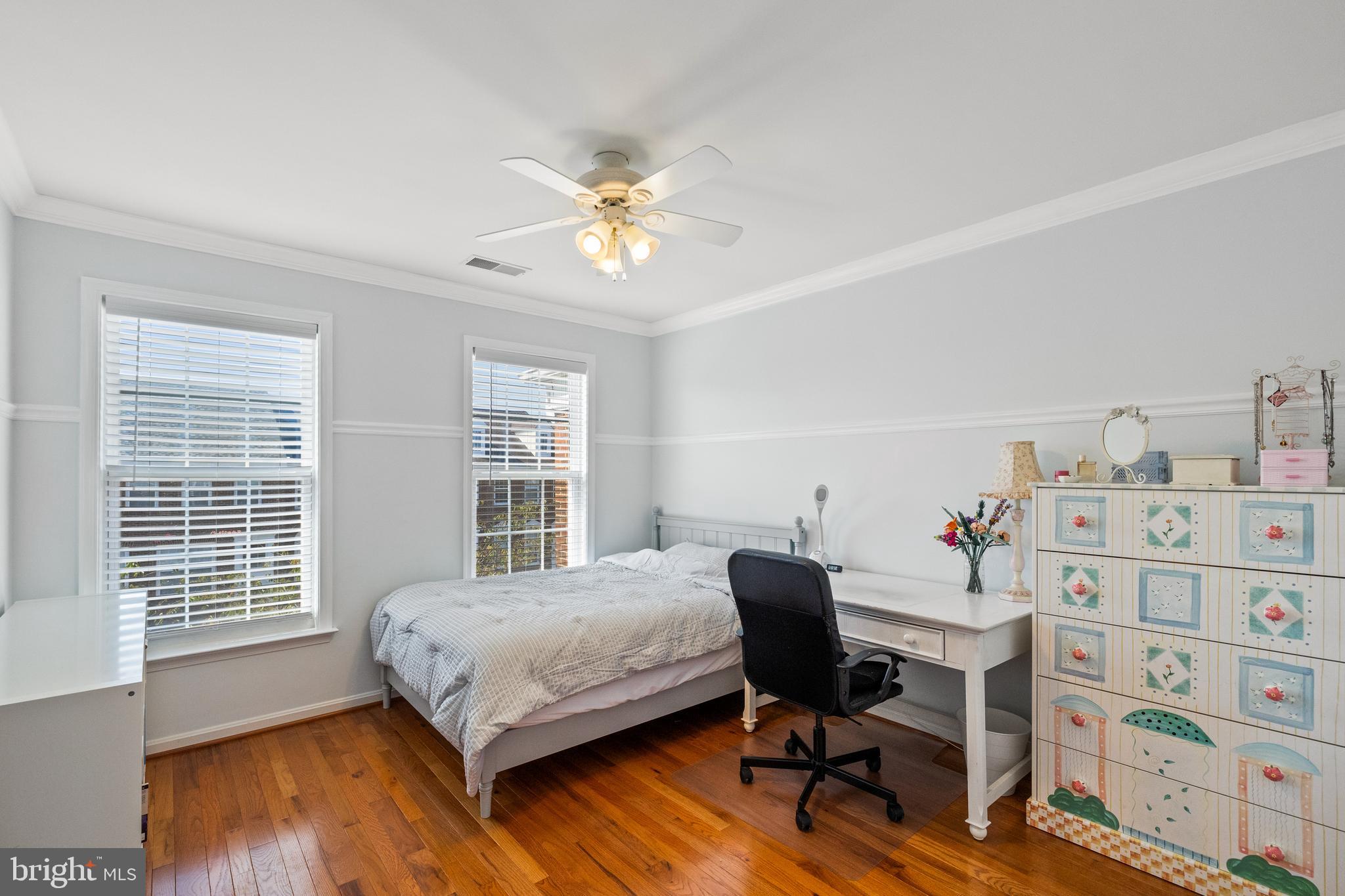 15016 Danube Way Haymarket, VA 20169 - Photo 12 of 22 a bedroom with a bed and a desk in it