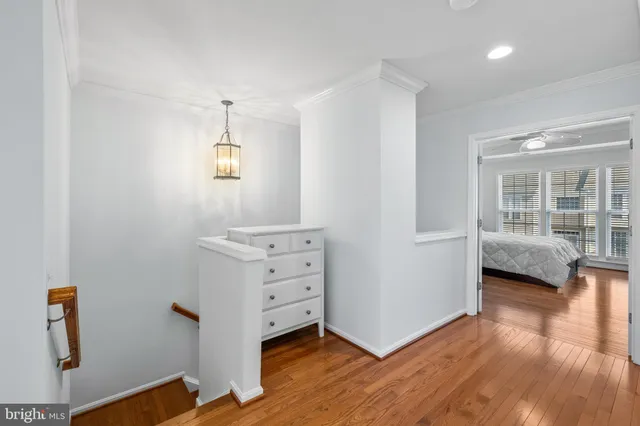 a view of livingroom with hardwood floor and hallway