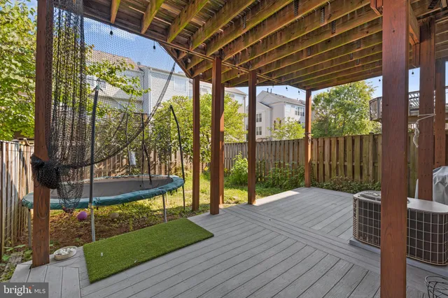 a view of a chairs on wooden deck