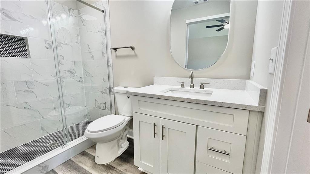 5 Green Road Griffin, GA 30224 - Photo 20 of 34 a bathroom with a sink toilet and shower