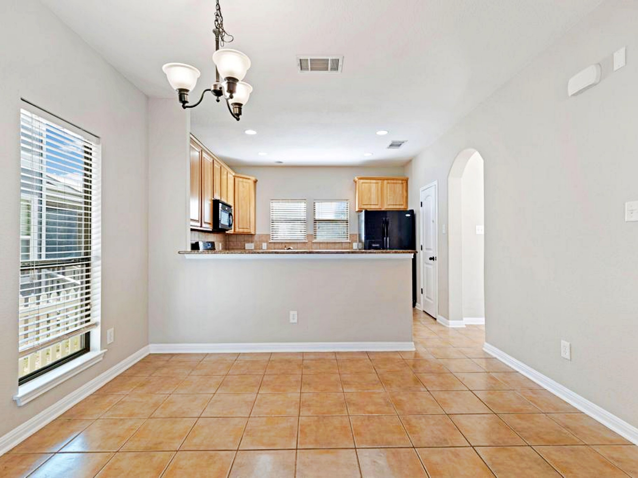 247 Cleveland Kyle, TX 78640 - Photo 18 of 19 tile in breakfast/dining area