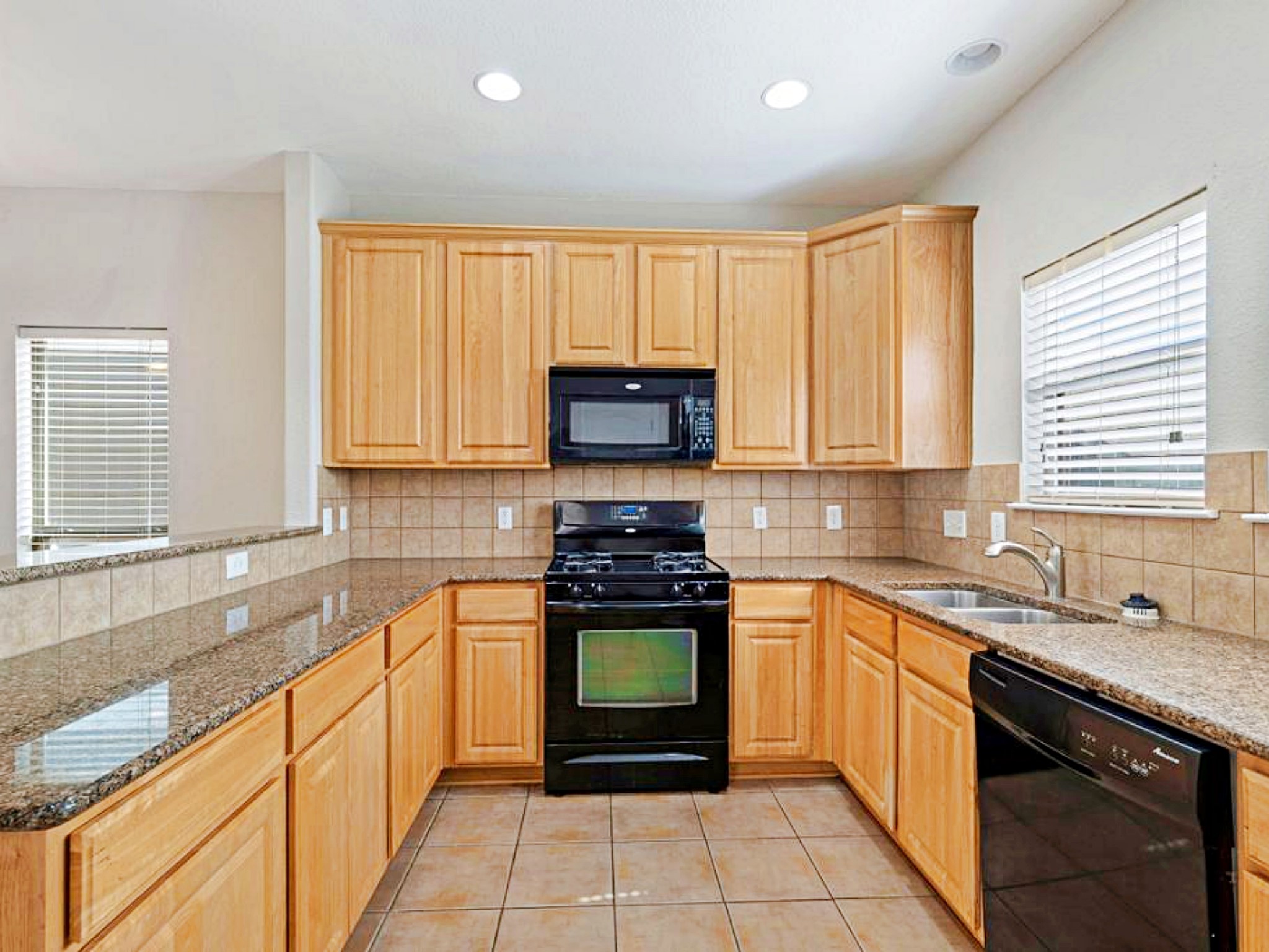 247 Cleveland Kyle, TX 78640 - Photo 4 of 19 Chef won't run out of space here ~ Ample bar, drawer and cabinet storage