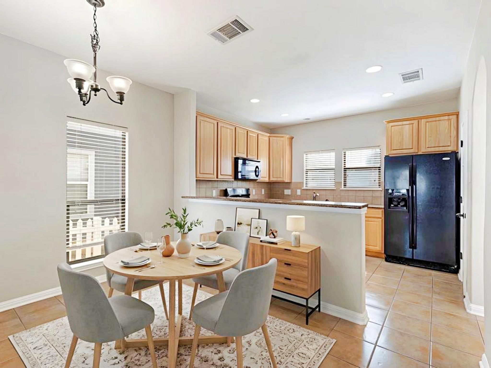 247 Cleveland Kyle, TX 78640 - Photo 5 of 19 Open concept kitchen and dining is uplifting (re-imagined with virtual furniture)