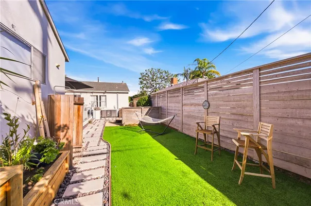 a garden view with a seating space