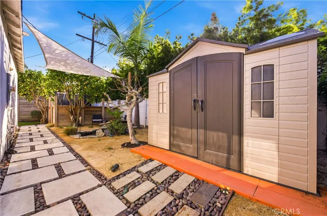a backyard of a house with seating space