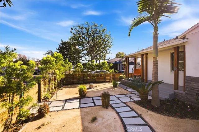 a view of a chairs and tables in the patio