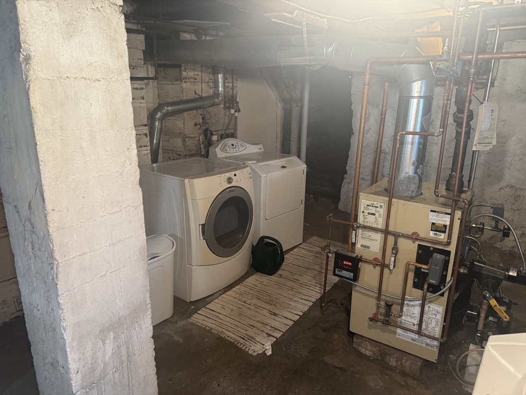 5 Curve Street, Unit 1 Lexington, MA 02420 - Photo 10 of 10 a utility room with dryer and washer