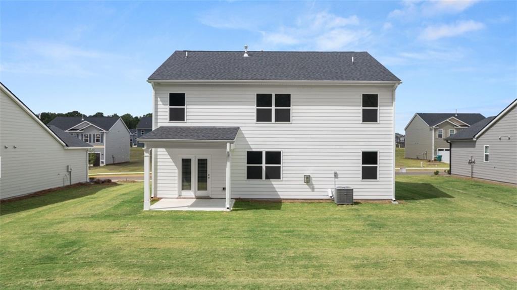 438 Abbott Road Statham, GA 30666 - Photo 2 of 56 a view of a house with a yard