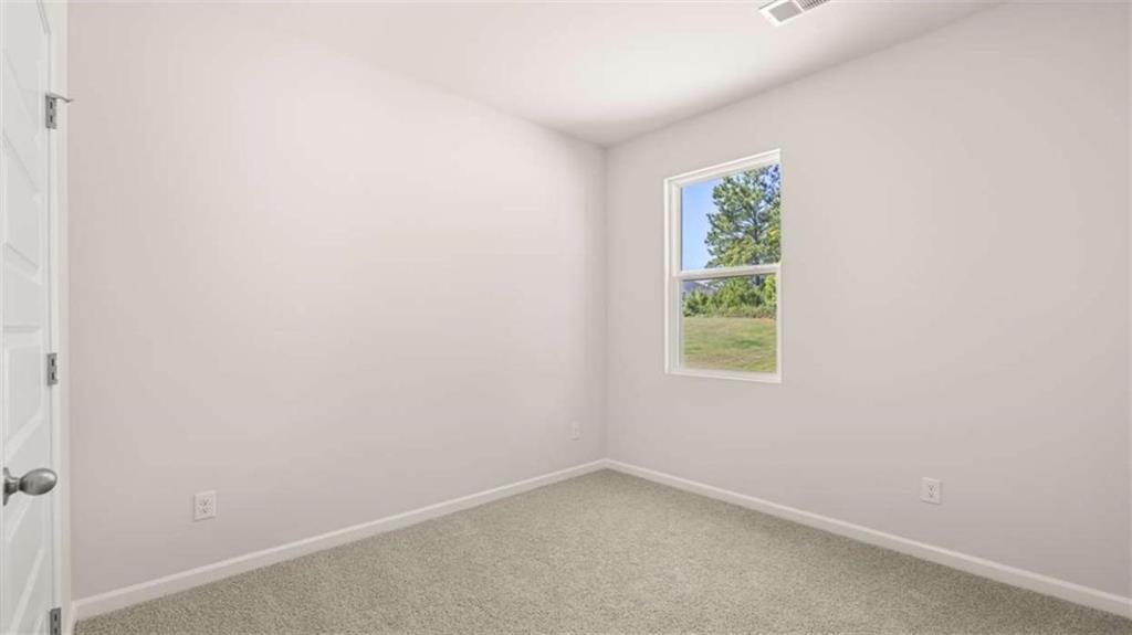 438 Abbott Road Statham, GA 30666 - Photo 26 of 56 an empty room with a window